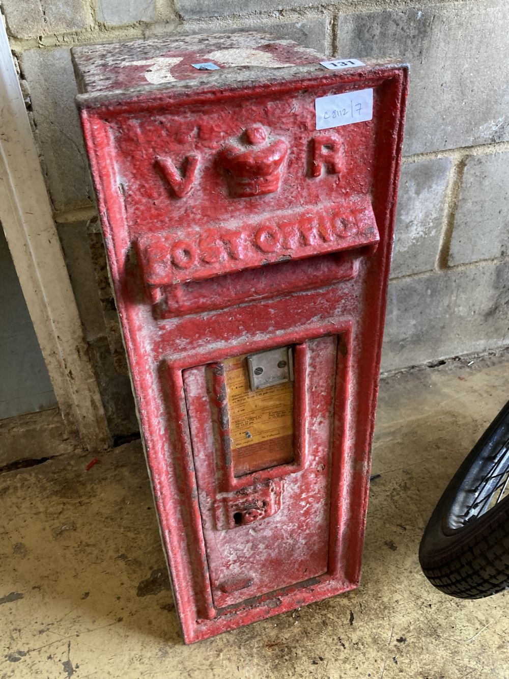 A Victorian cast iron postbox, width 26cm, depth 32cm, height 71cm